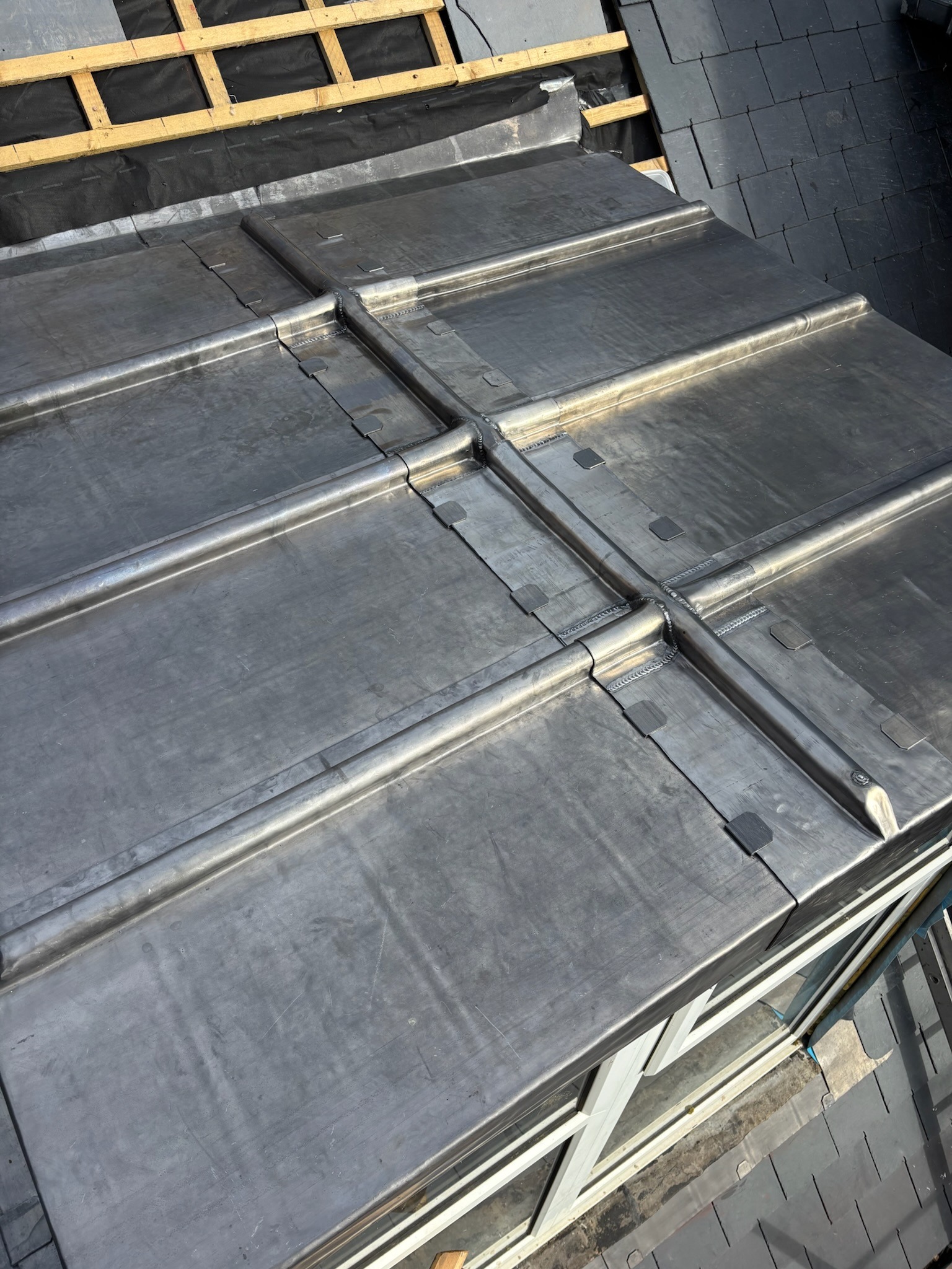 summer lead roof maintenance inspection on lead roof detailing